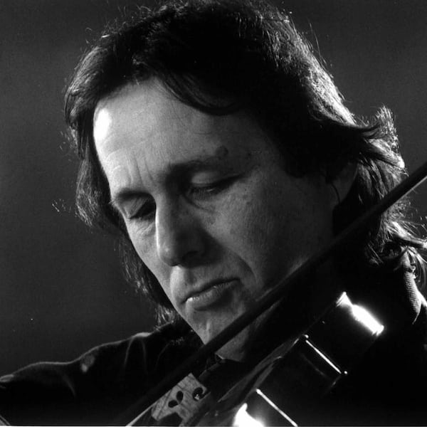 The violinist-Photo of renowned Slovenian international performer and professor of violin Volodja Balzalorsky. Photo by Tihomir Pinter